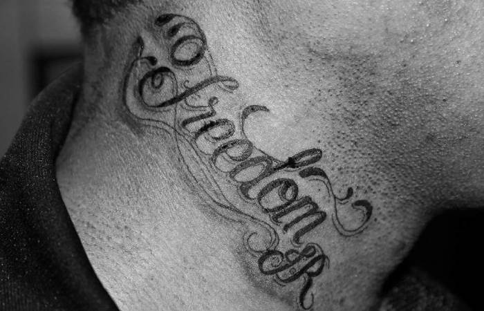 Script_Lettering Neck Tattoo