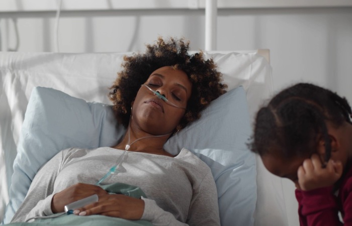 Black Woman In Hospital Bed